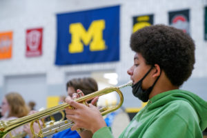 Parker Middle School 8th grader Silas W. practices the trumpet.