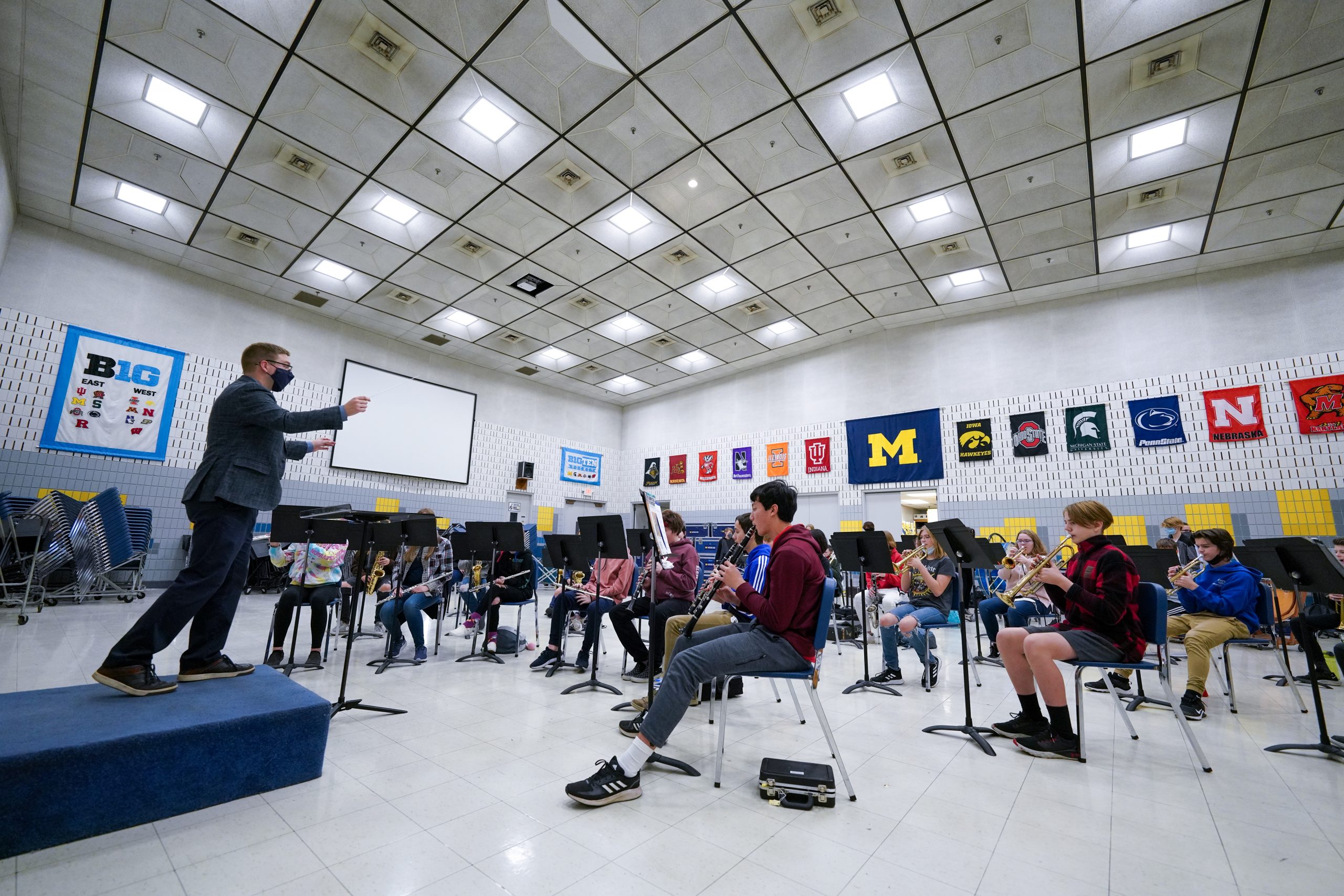 SMTD PhD candidate Michael Vecchio (music education) conducts the Parker 8th graders.
