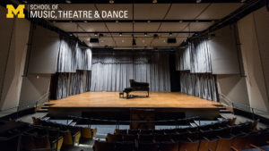 Zoom background, McIntosh Theatre stage with grand piano at center