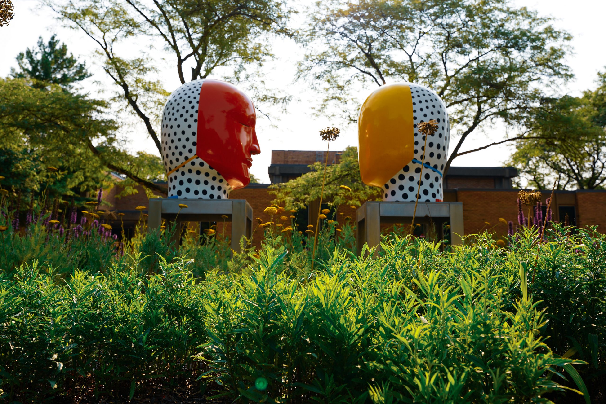 Head sculptures outside the Moore building entrance