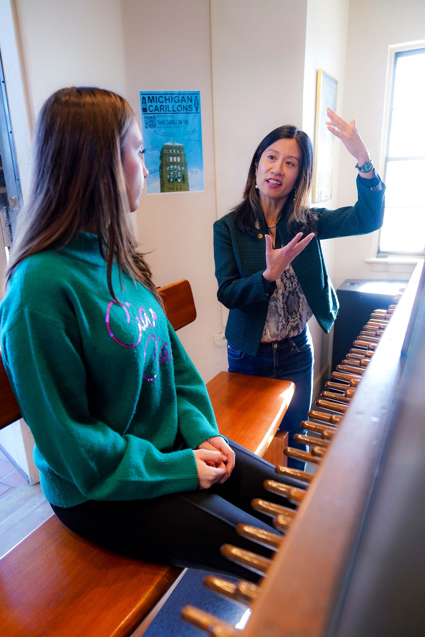 Teacher instructs a student at the carillon