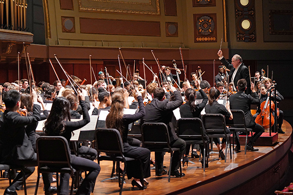 UMSO students and Prof. Kenneth Kiesler playing onstage at Hill Auditorium