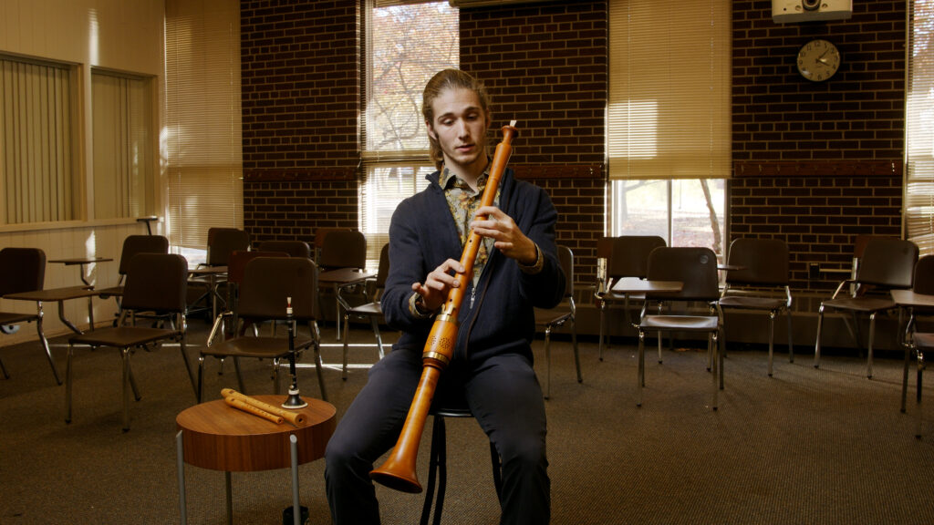 Senior Oliver Bishop with the shawm, one of the traditional instruments featured in Bernarda Alba.