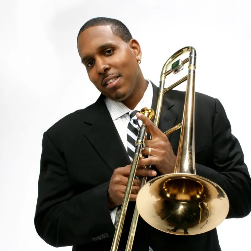 Vincent Gardner poses with his trombone