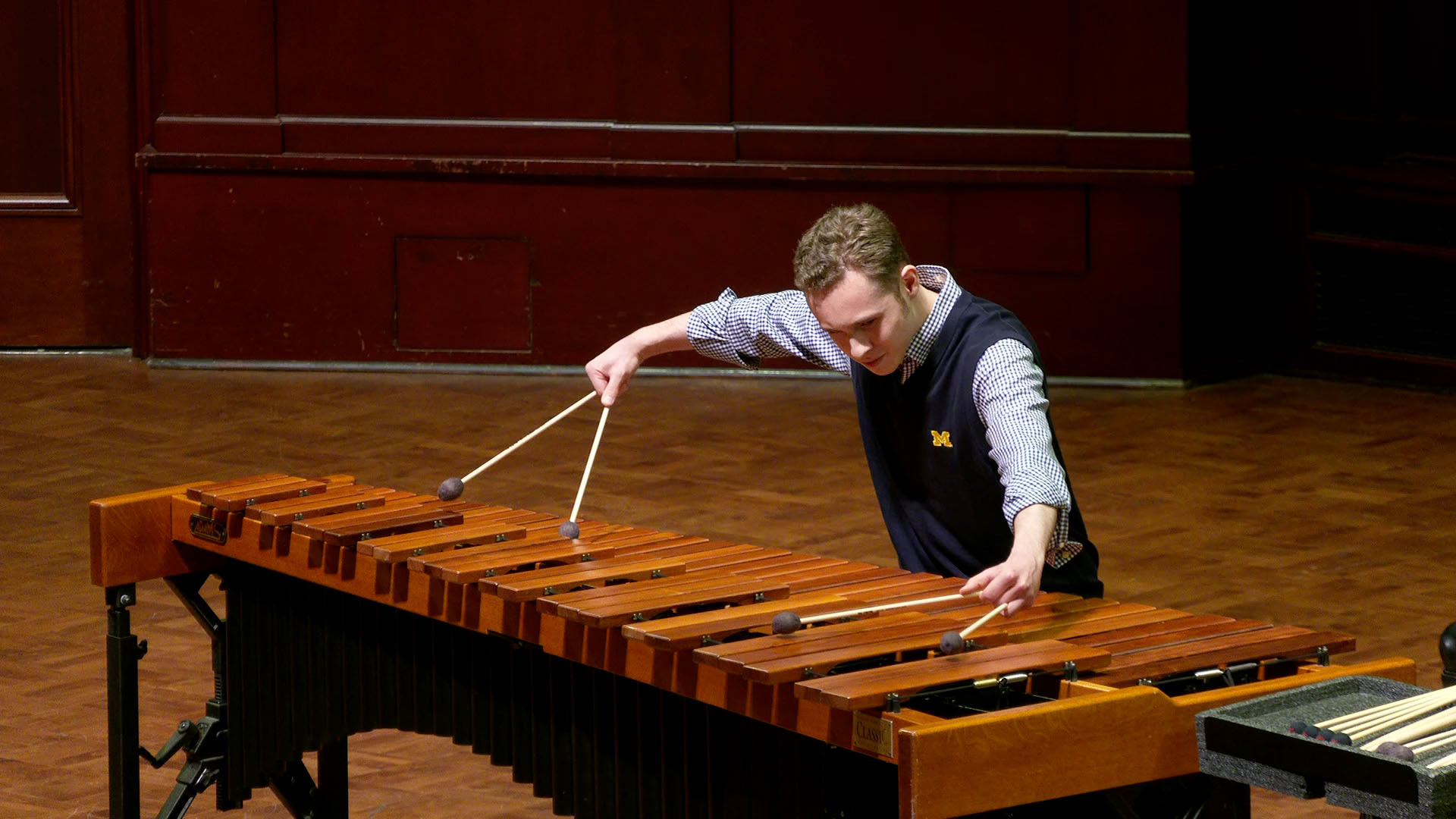 Karl Rueterbusch performs marimba on stage
