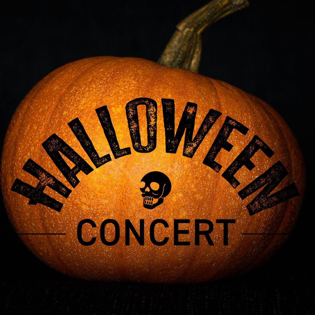 HALLOWEEN CONCERT - title logo with a skull icon, pumpkin in the background
