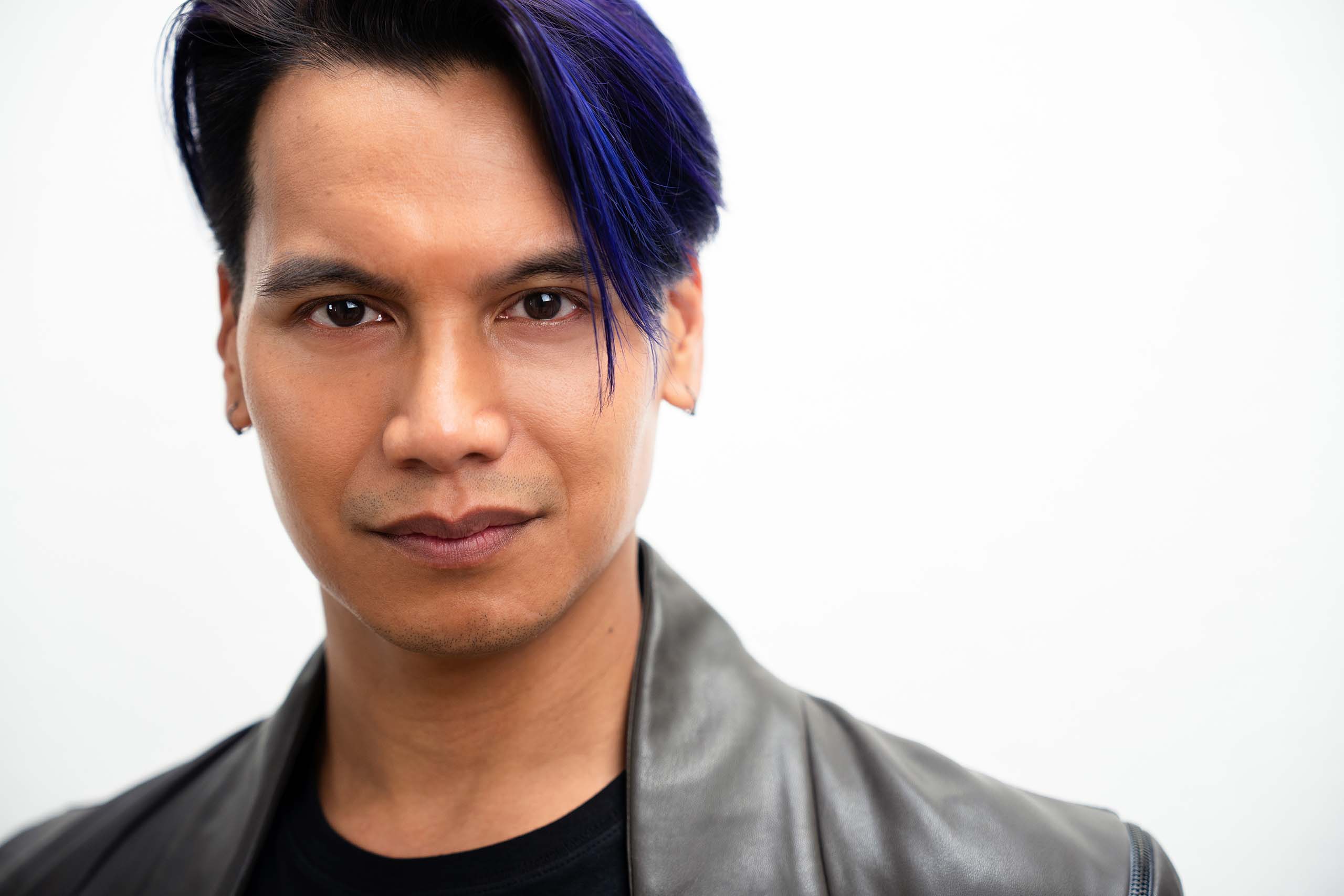 Studio headshot of Darryl Semira
