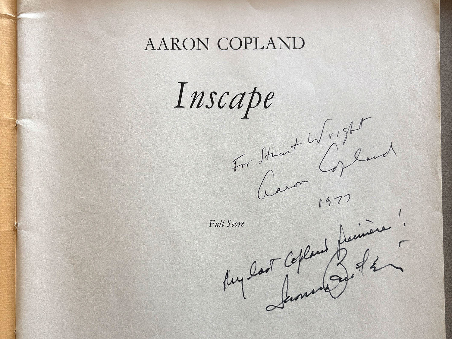 Part of the title page of Aaron Copland's score for Inscape, featuring two signature inscriptions dated 1977.