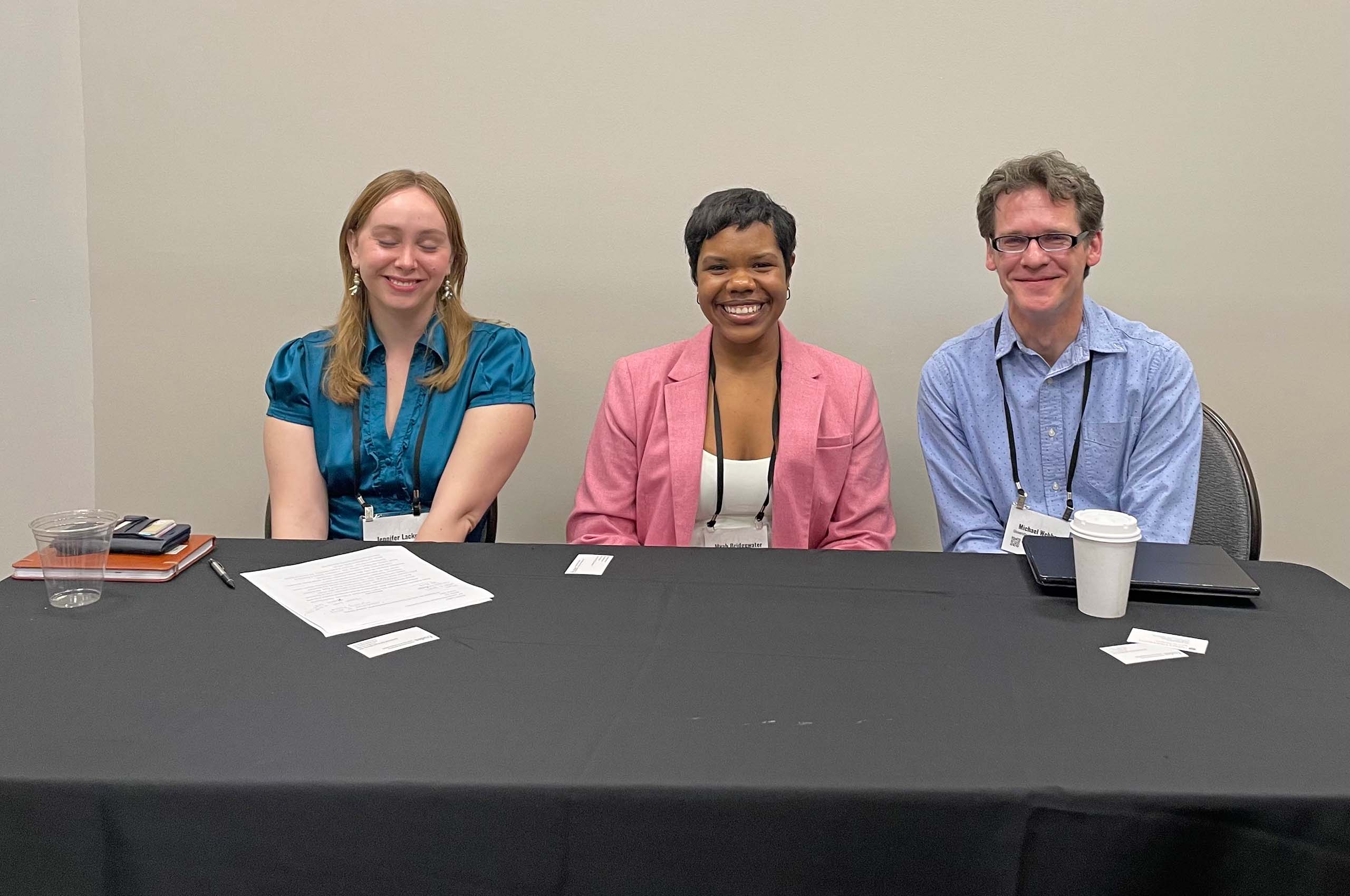 Myah Bridgewater middle on Emerging Scholars panel Mid-America Theatre Conference 2025 Photo Karin Waidley Three young professionals seated for a conference panel - Myah Bridgewater at center.