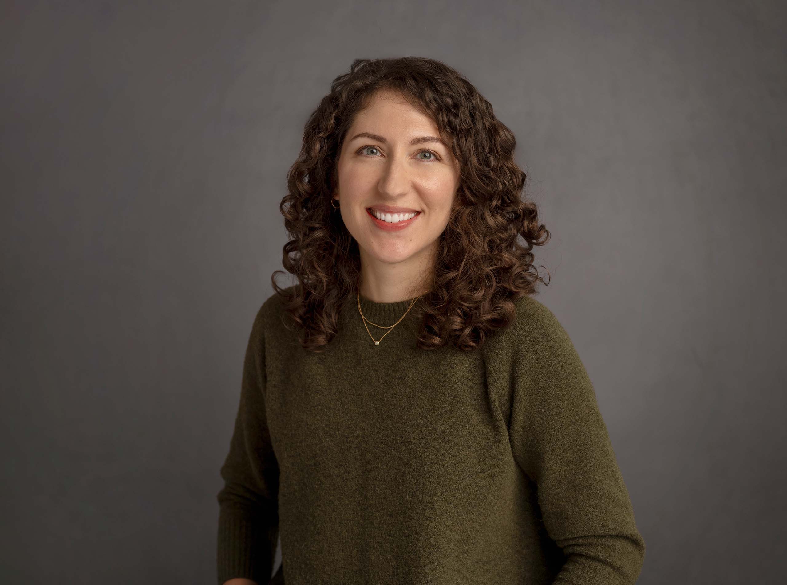 Casual studio portrait of Alexandra Rodriguez