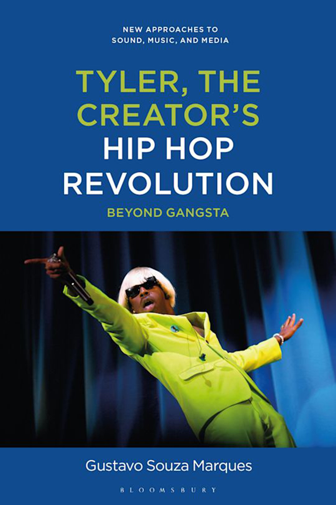 Book cover with a blue background and photo of Tyler, the Creator on stage in a bright green suit.