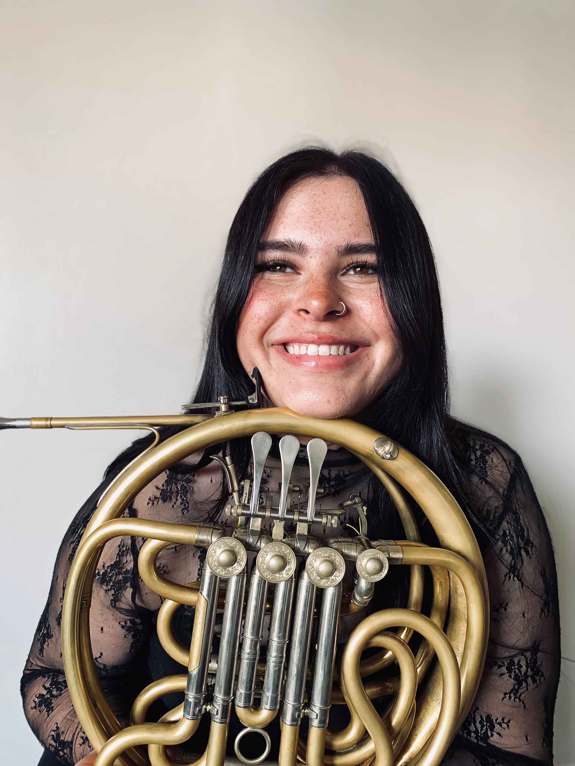 Headshot of Isabella Kolasinski with French Horn
