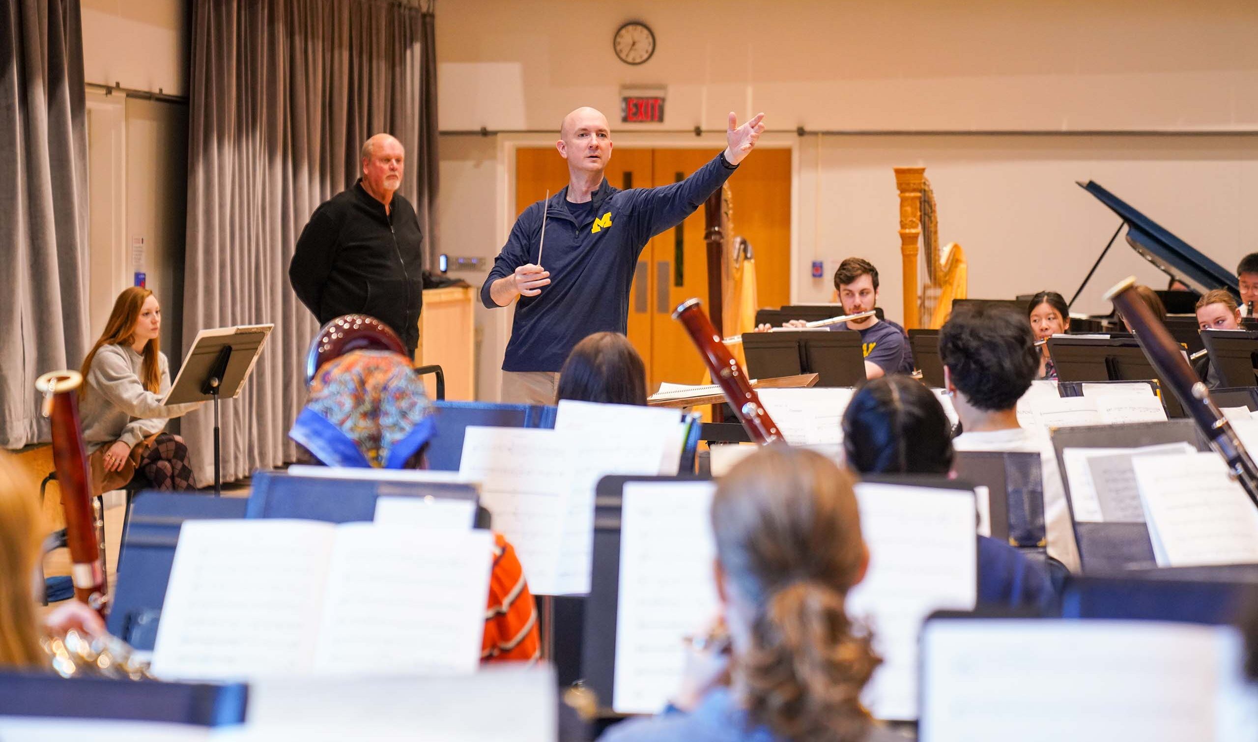 Jason Fettig conducts during a band rehearsal.