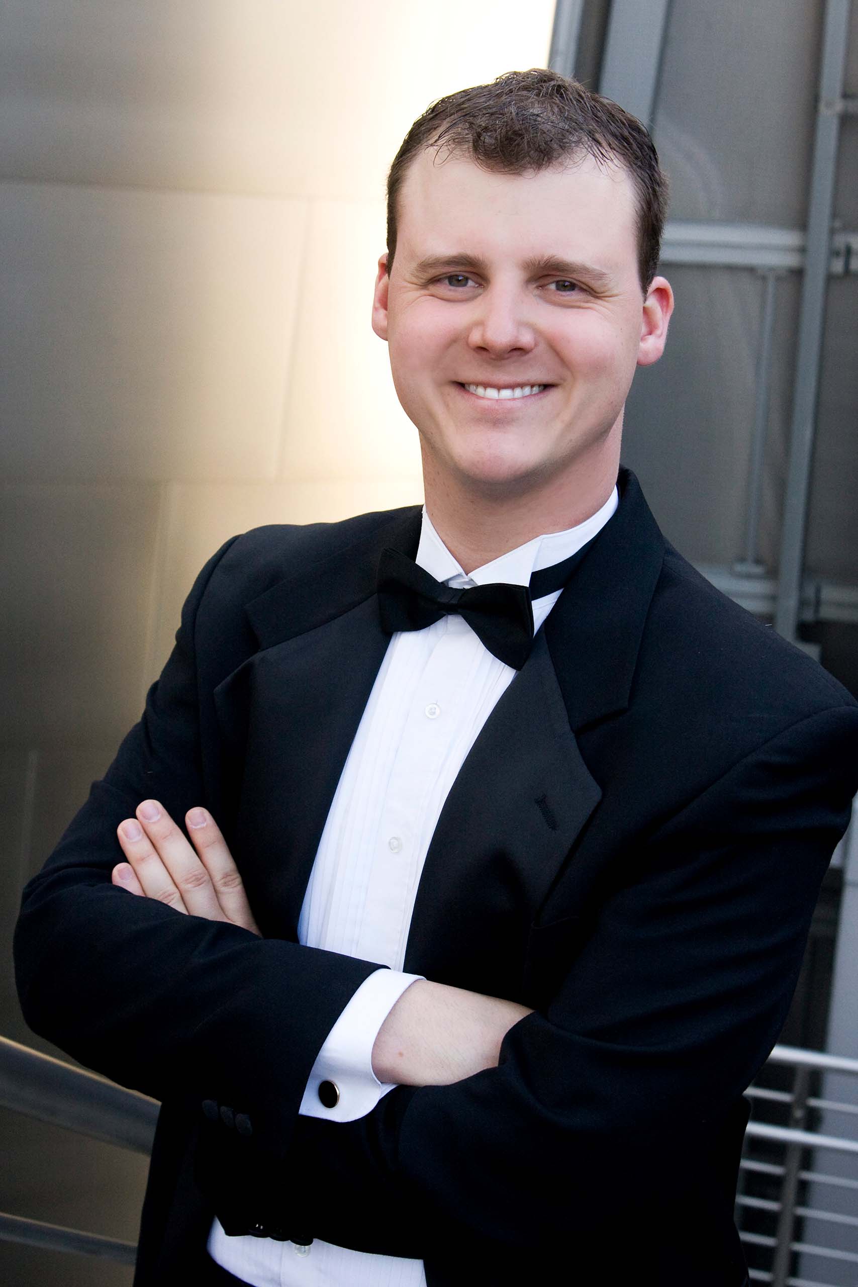 Standing portrait of Joshua Roach wearing a concert tuxedo.