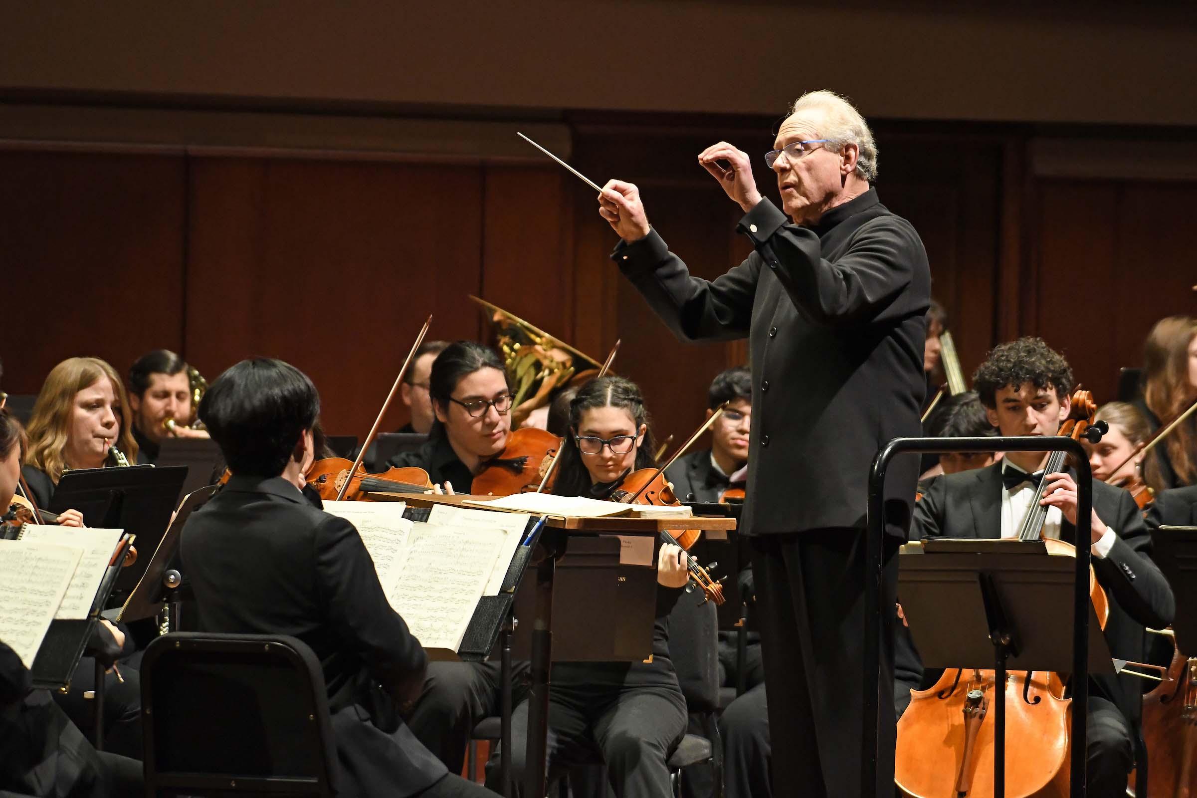 Kenneth Kiesler conducts  the University Symphony Orchestra during a concert.