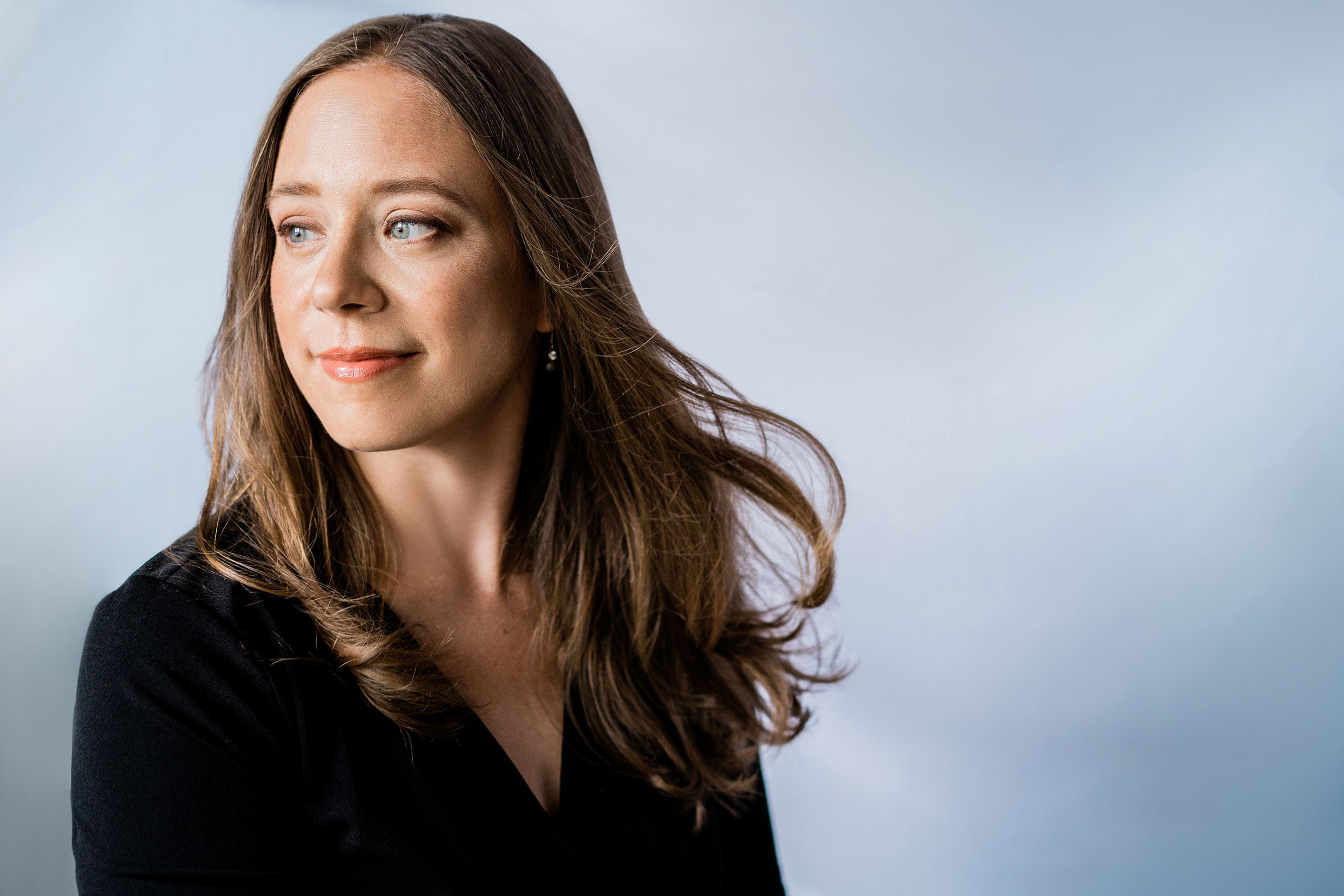 Candid studio portrait of Kirsten Volness