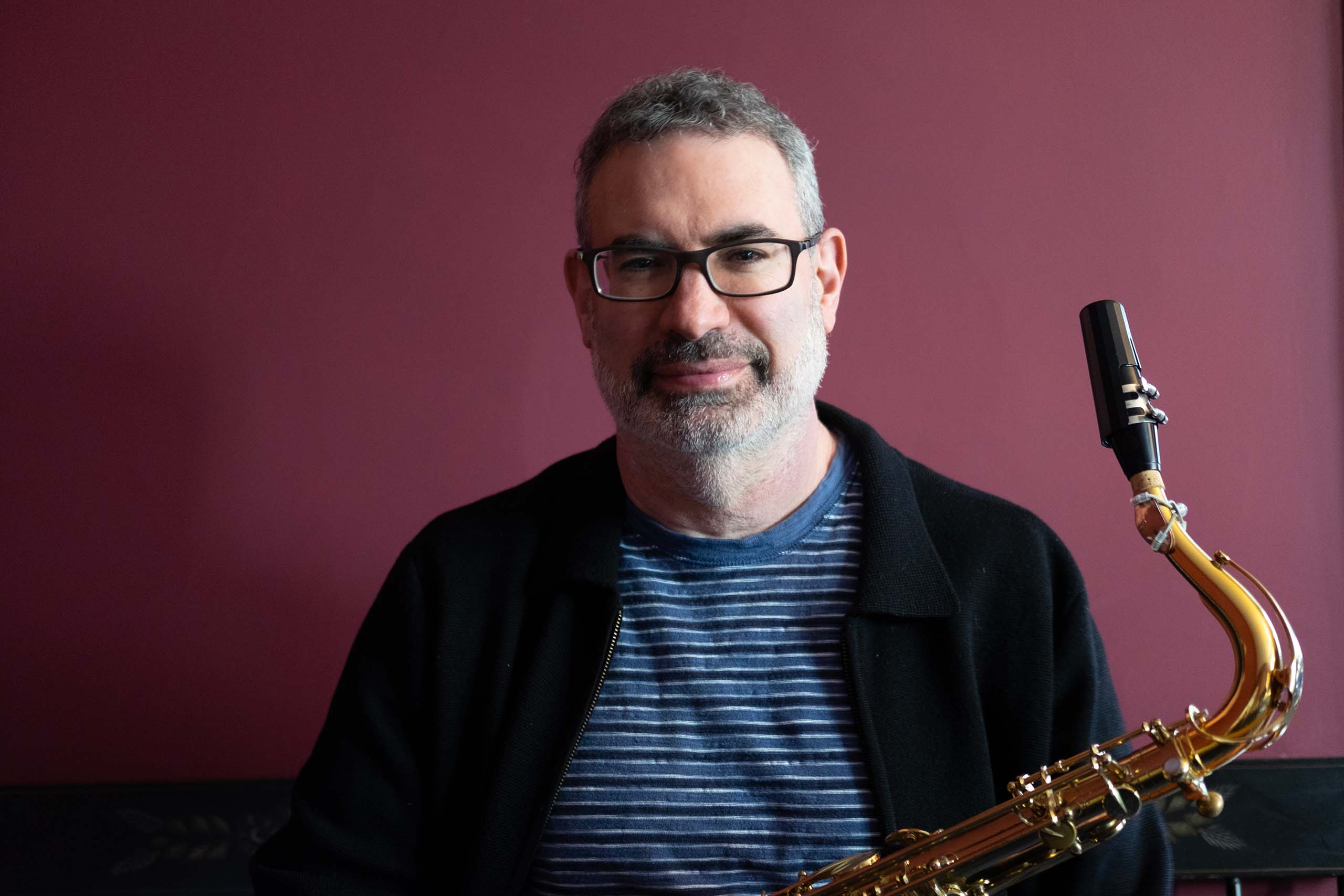 highlight Matthew Levy Photo Willa Rohrer Studio portrait of Matthew Levy holding his saxophone