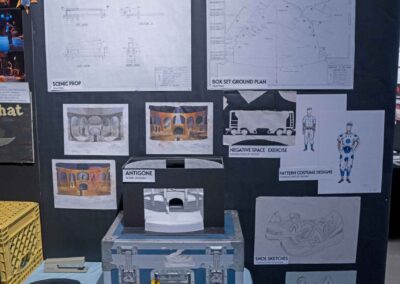 Benjamin Mehta’s display featuring sketches, set models, and example props.