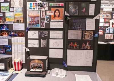 Josi Middaugh’s display of concept sketches, set modes, and production photos.