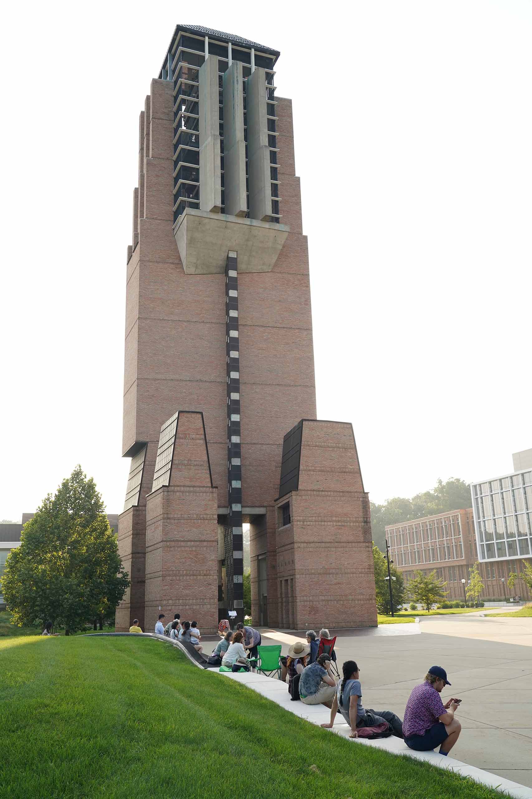 Lurie Tower with people seated outside.